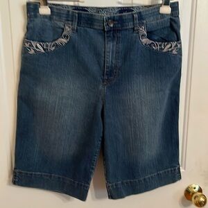 Jeans Bermuda length, size 12.  Machine was inside out, tumble dry low.